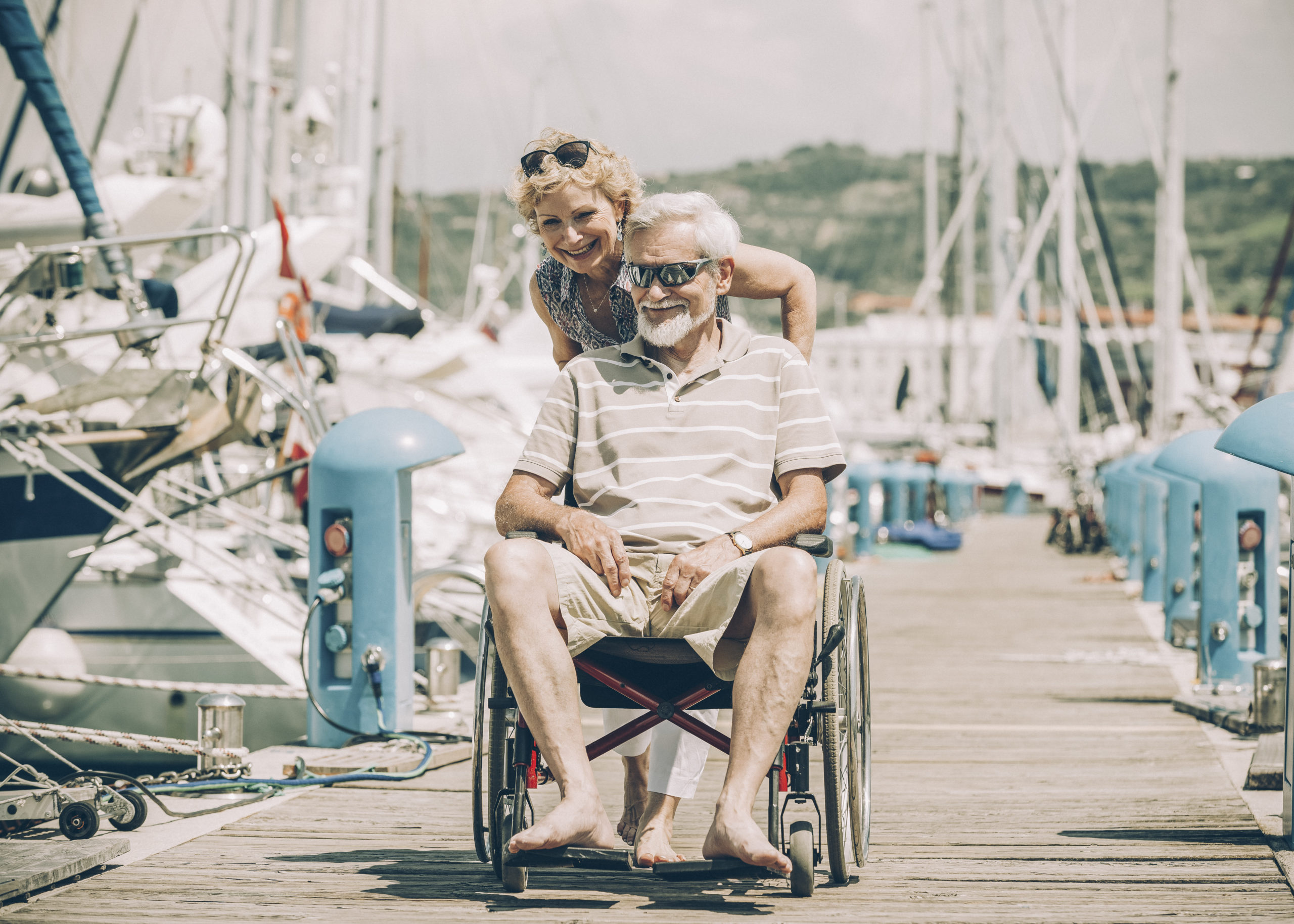 Senior man in a wheelchair on vacation. Senior man in a wheelchair on vacation.